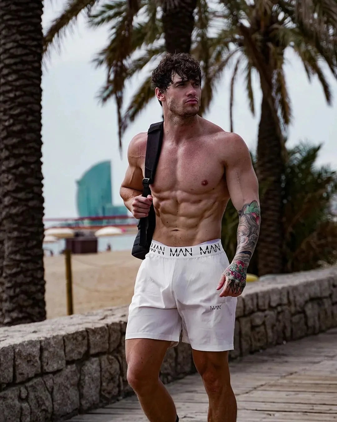 Summer Hot Selling Physical Exercise Men Fitness Jogging Fitness Shorts Men Breathable Quick Drying Sportswear Beach Shorts